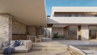 Ambiente minimalista en la zona exterior de Villa Piscis