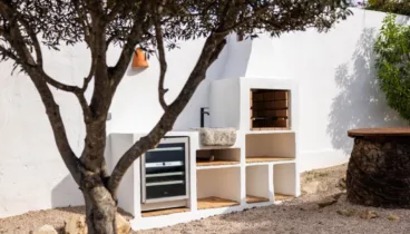 Área de barbacoa integrada en el entorno