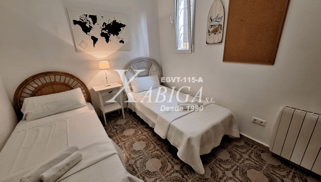 Dormitorio con dos camas