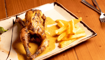 Receta de pollo con toque gourmet en restaurante Posidonia
