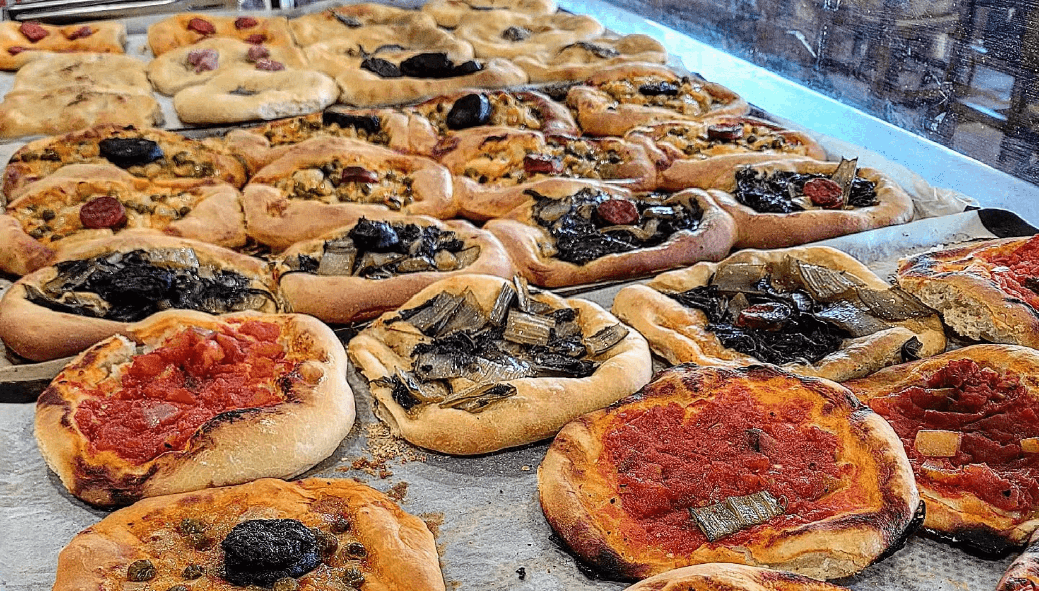 Freshly baked traditional cocas with the flavor of Marina Alta - Jávea ...