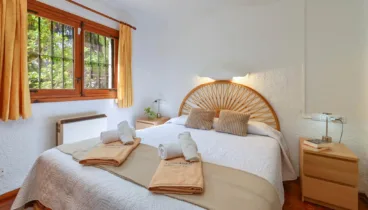 Dormitorio con litera en casa vacacional cerca de la playa