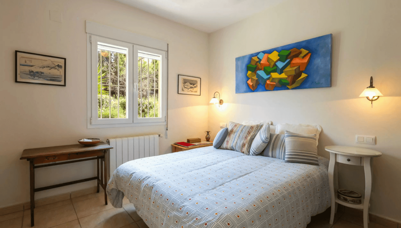 Dormitorio principal con acceso a la terraza