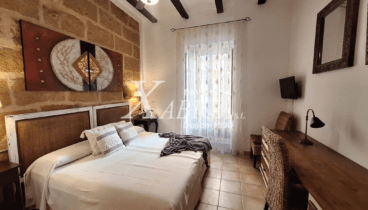 Dormitorio doble con iluminación natural