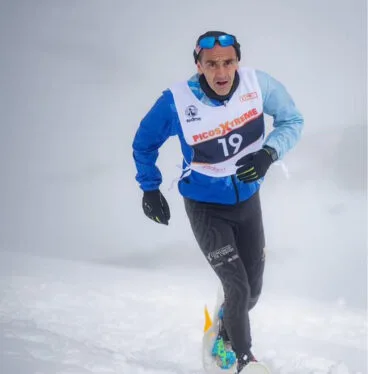 Nasio Cardona durante la carrera en la nieve