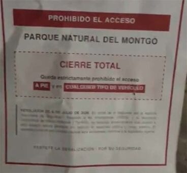 Cartel que prohibe el paso por la alerta