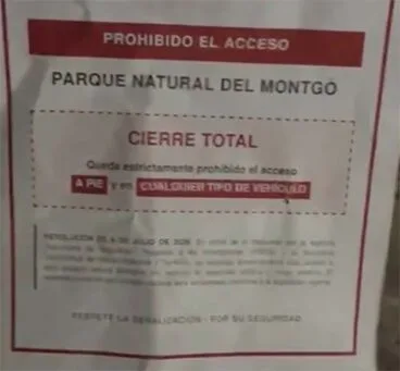 Cartel que prohibe el paso por la alerta
