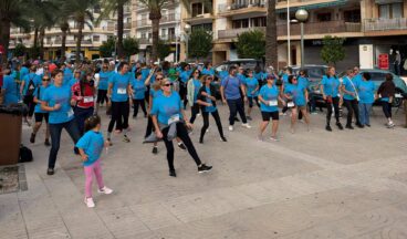 Calentamiento antes de la marcha solidaria