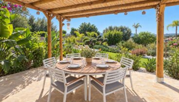 Terraza con pérgola para comer